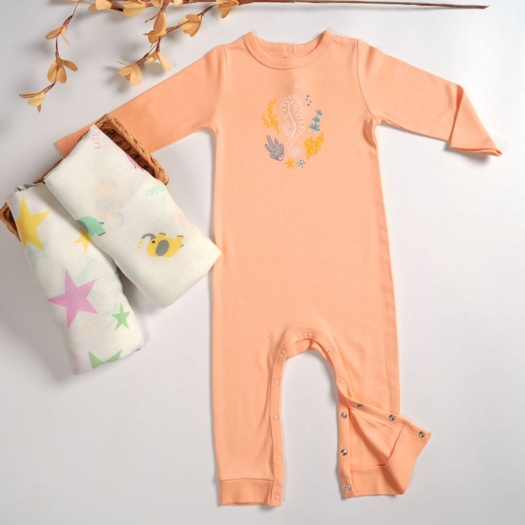 Organic baby sleepsuit and muslin swaddles 
